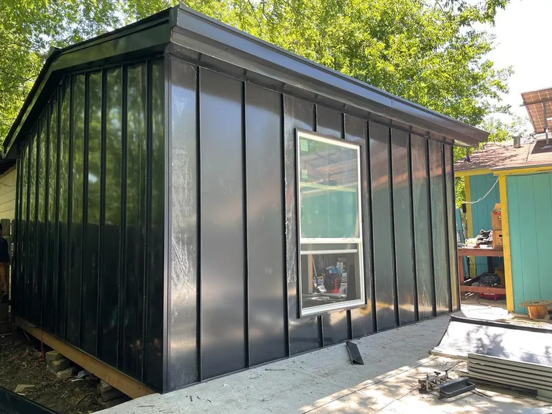 Black standing seam metal wall panels for Roof Inspection in Sunnyside