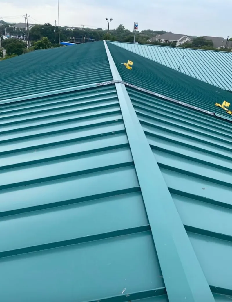 Green commercial metal roof ridge and valley for Metal Roof Repair in Sunnyside