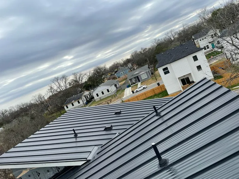 Standing seam metal roof panels with vents for Skylight Repair in Sunnyside